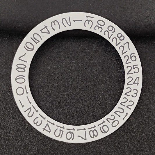 Black and grey date disk overlay for NH35/NH36 watches, enhancing dial clarity and style.