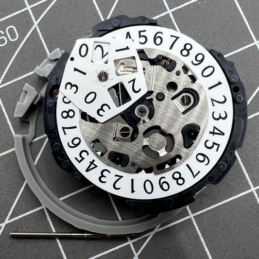 Epson YM04A quartz watch movement with big date display, precise timekeeping for watch repairs.