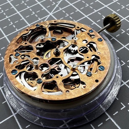 Hollow Rose gold watch with mechanical movement, 4 eye subdials, and 7 hands