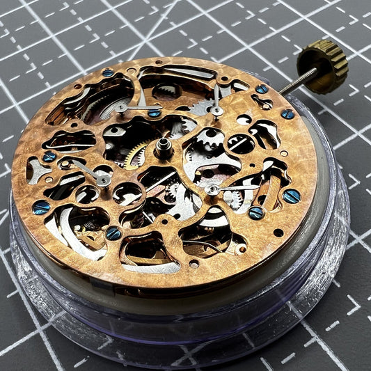 Hollow Rose gold watch with mechanical movement, 4 eye subdials, and 7 hands