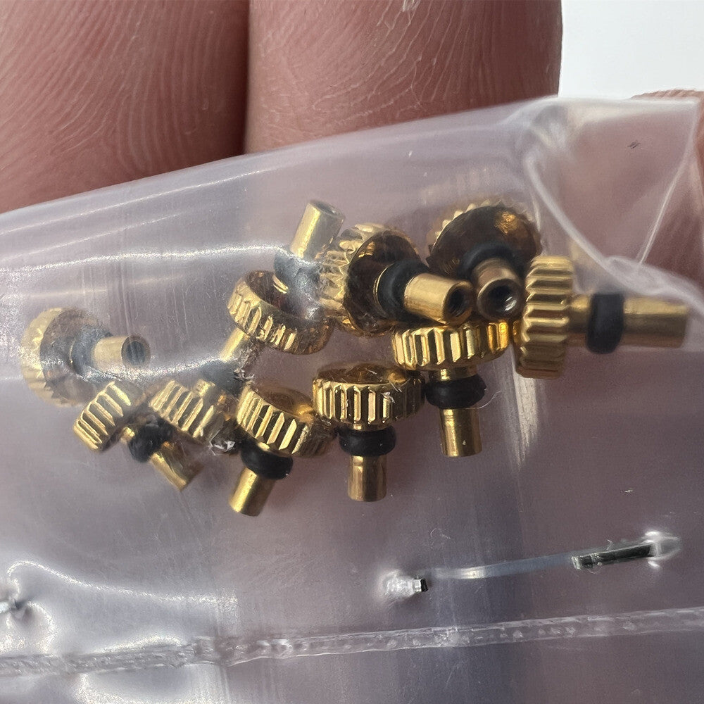 Golden watch crowns replacement for Orient watch movements, ideal for precise repair and restoration.