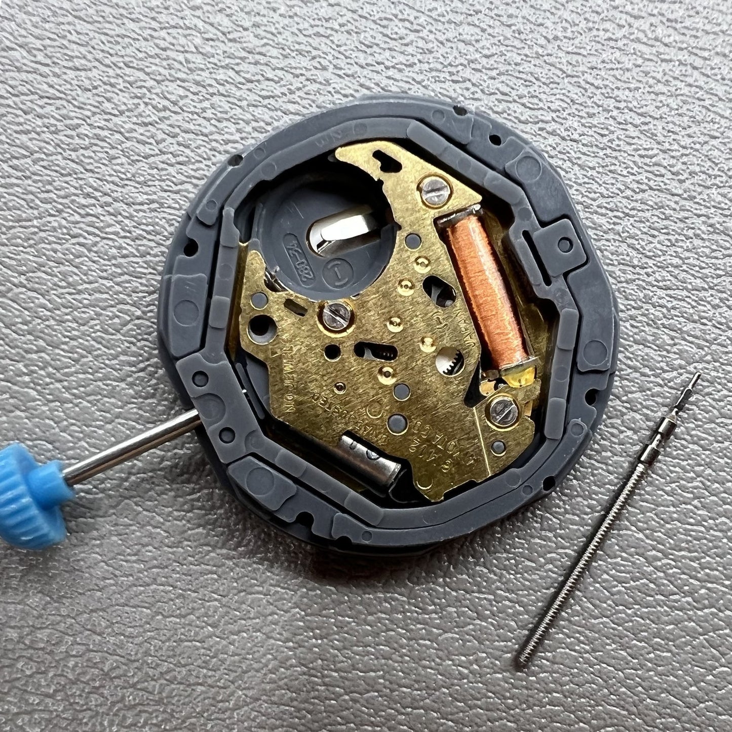 Miyota Japan 6M12 quartz movement watch with date at 6 o'clock and three hands, precise timing