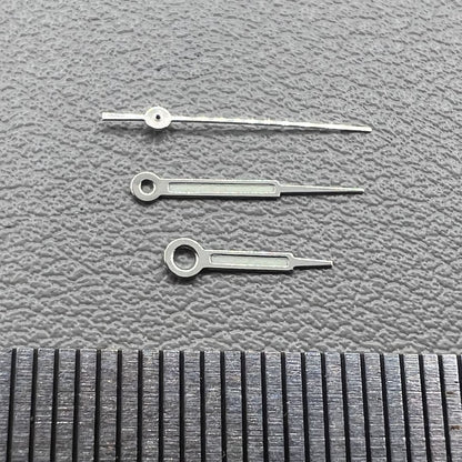 Set of silver trim green lume pointed hands for Ronda 515 watch movement, perfect for precise time reading.
