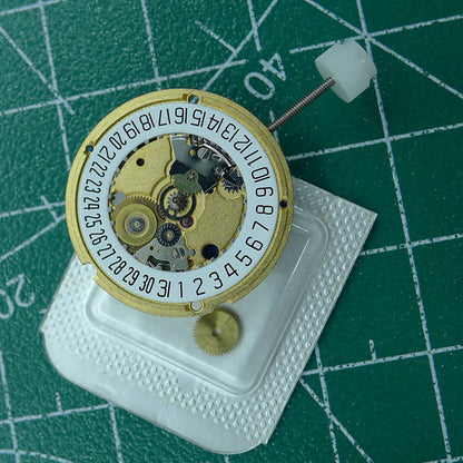 ETA 956.412 Swiss quartz watch movement with 3 hands and date display at 6 o'clock, ideal for watch repairs.