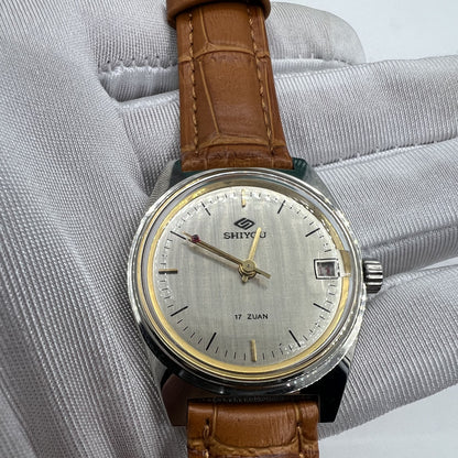 Shiyou 32mm grey manual mechanical watch with 17 jewels, single date display, and elegant design.