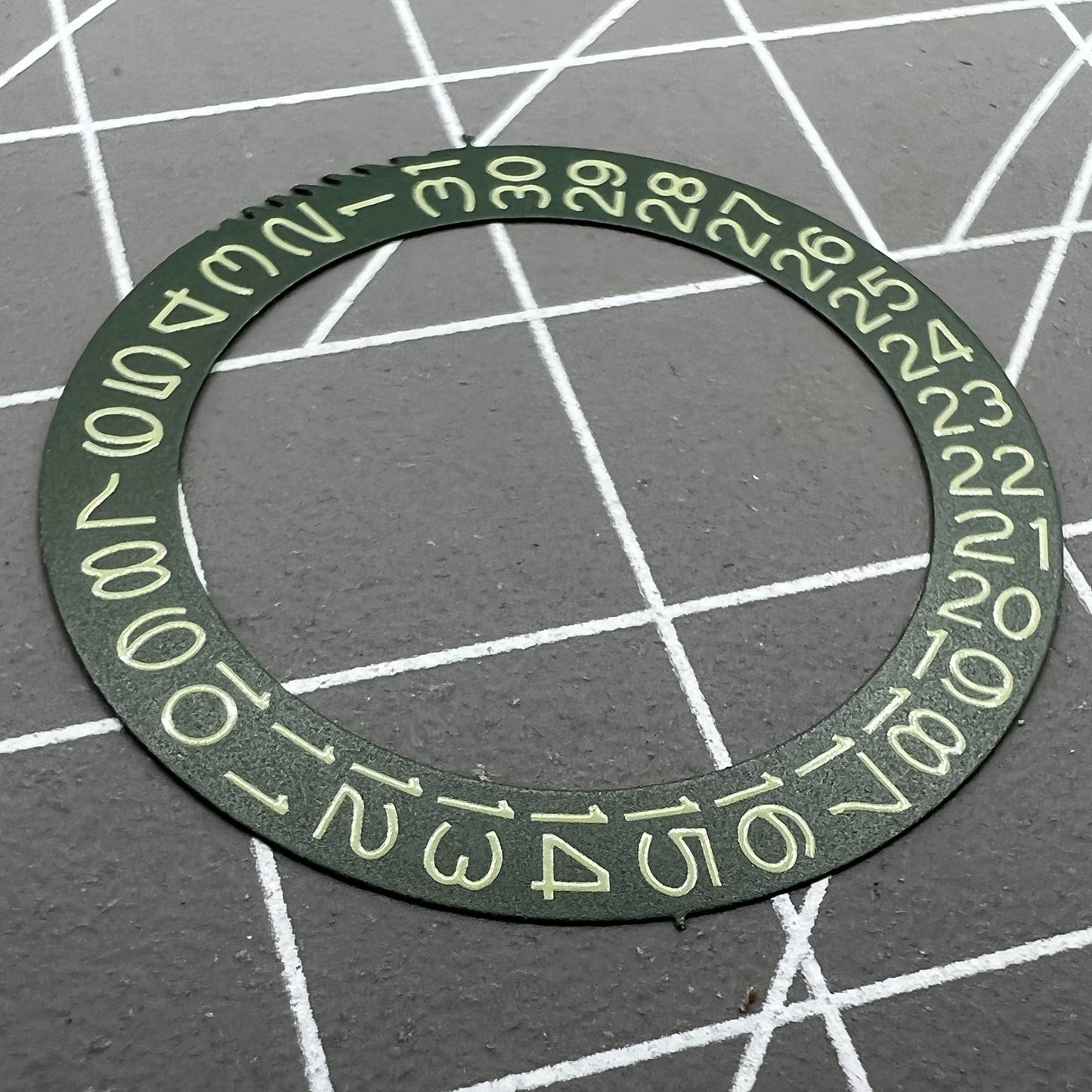 Dark hunter green Miyota NH35 NH36 date wheel featuring sage green font, perfect for vintage watch restoration.