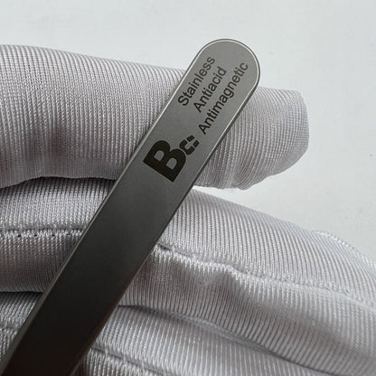 Swiss Bergeon 7026-3 antimagnetic fine hairspring tweezers for precise watch repair and adjustment.