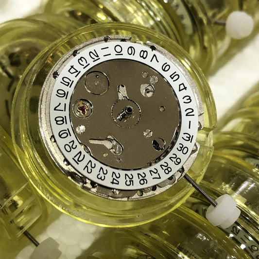 MG2813 automatic mechanical watch movement with silver 3-hand design and single calendar for precise timekeeping.