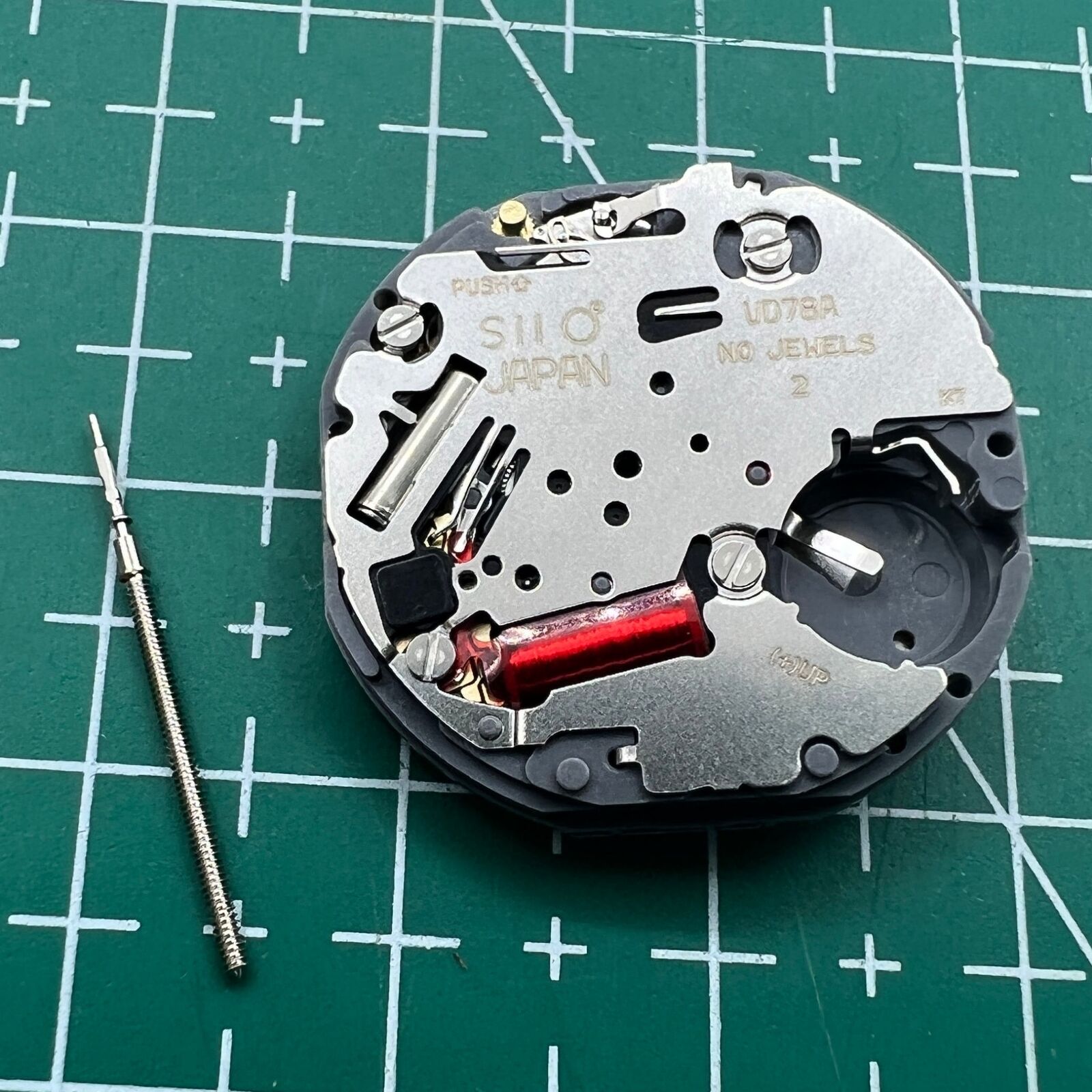 Hattori Epson VD78A quartz watch movement, Japan-made, ensures accurate and reliable timekeeping for watch repairs.