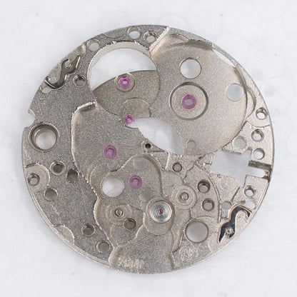 Silver main wheel bridge for ETA2660 and ETA2661 watch movements, precision disassembled part.
