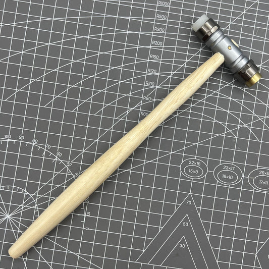 Swiss Bergeon 30417 hammer with replaceable brass and synthetic ends for delicate watch repairs.