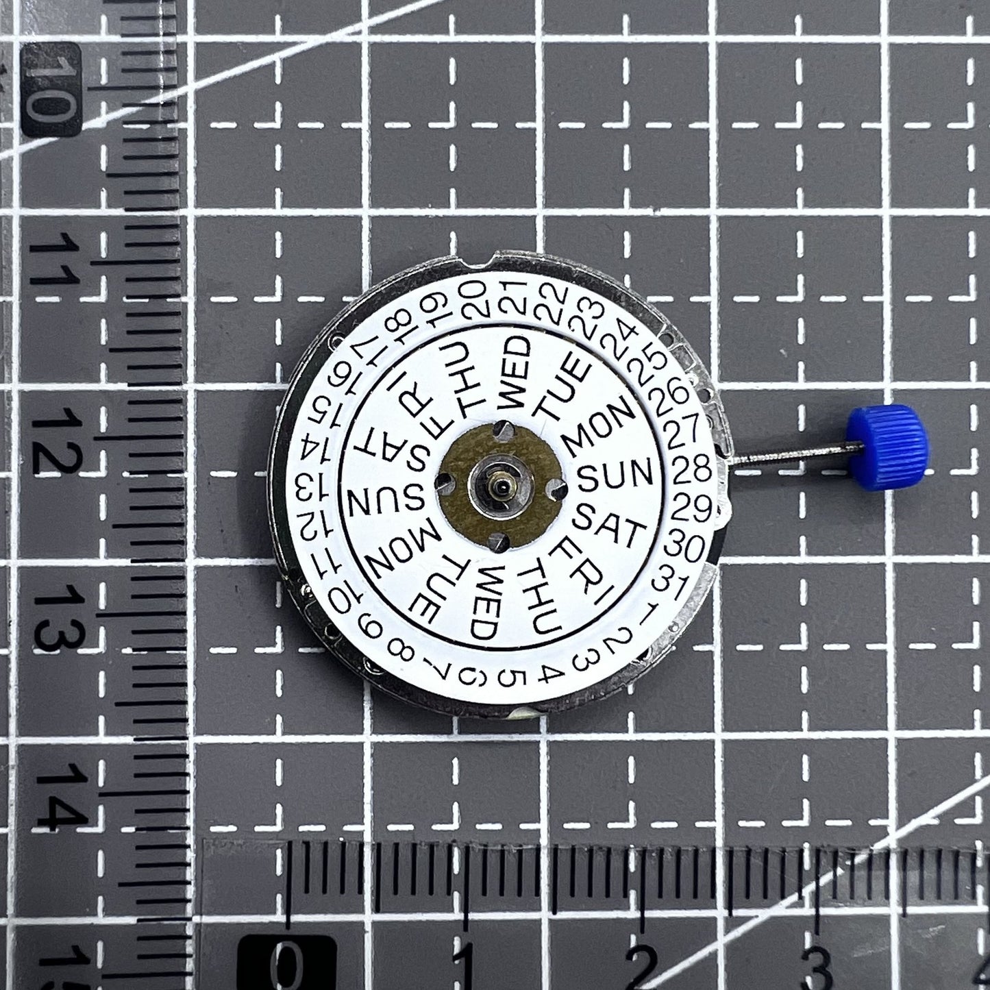 Swiss ISA 1198 quartz watch movement with 3 hands and English day-date display for precise timekeeping.