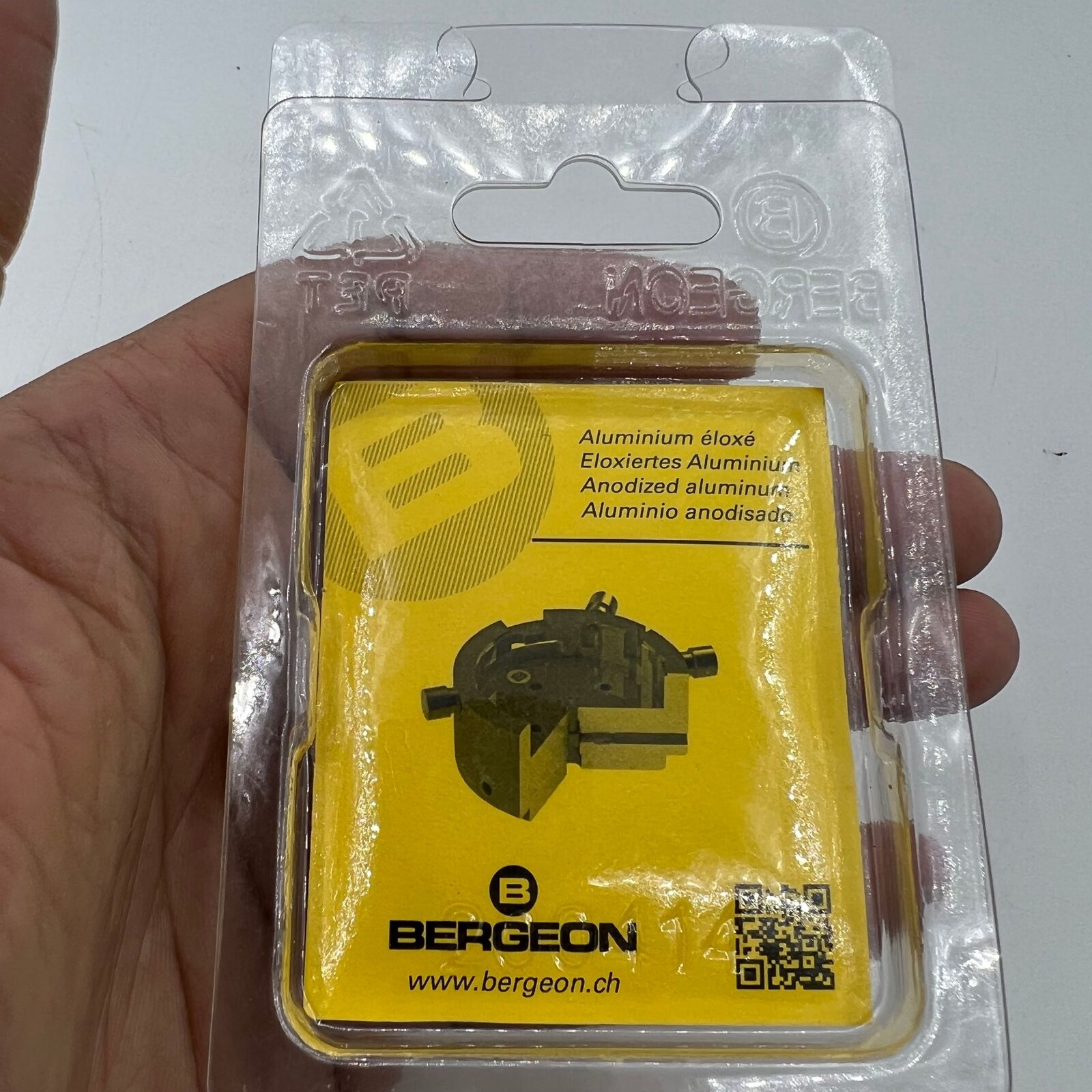 Bergeon 7100-11 1/2 watch movement holder securely clamps Swiss watch parts for precise repair.