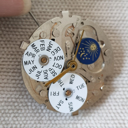 Shanghai R13-1 automatic mechanical watch movement displaying precise Chinese craftsmanship for watch repairs.