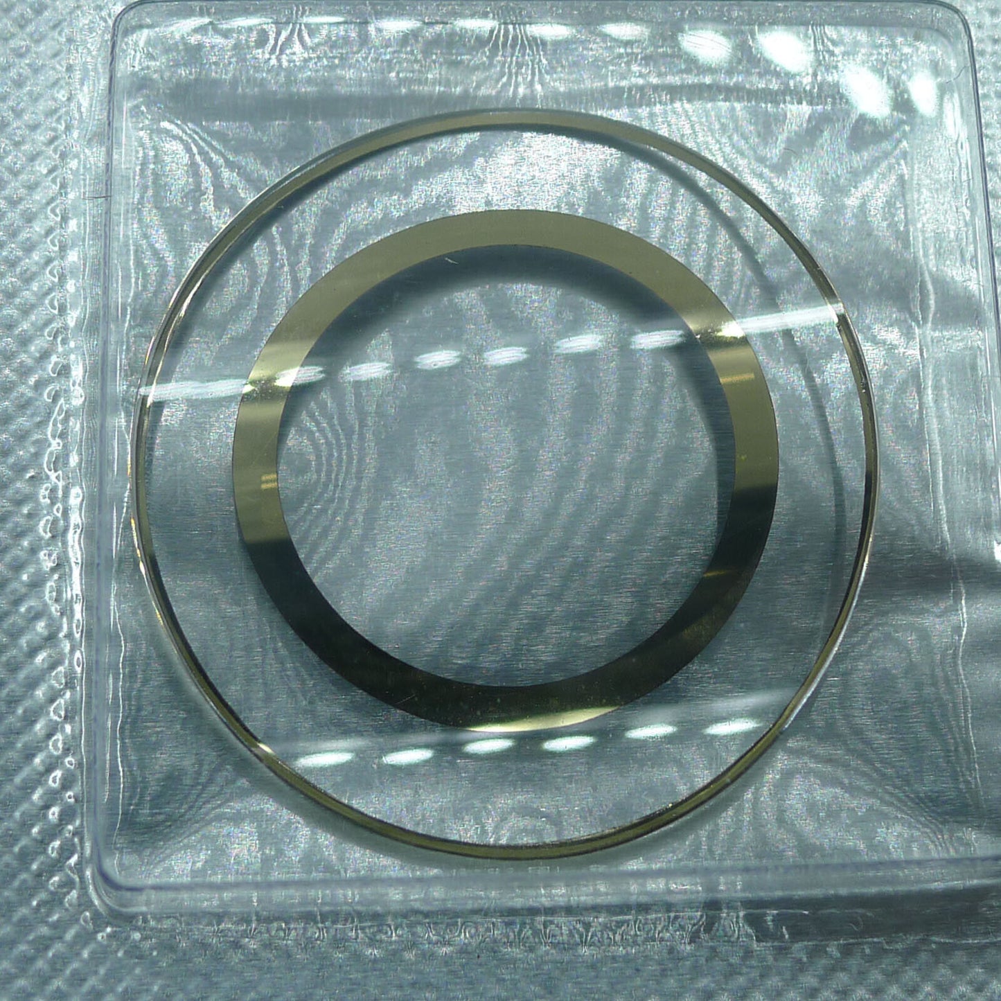 Colorful mineral crystal watch glass by SWA, enhancing durability and style for model 5519450.