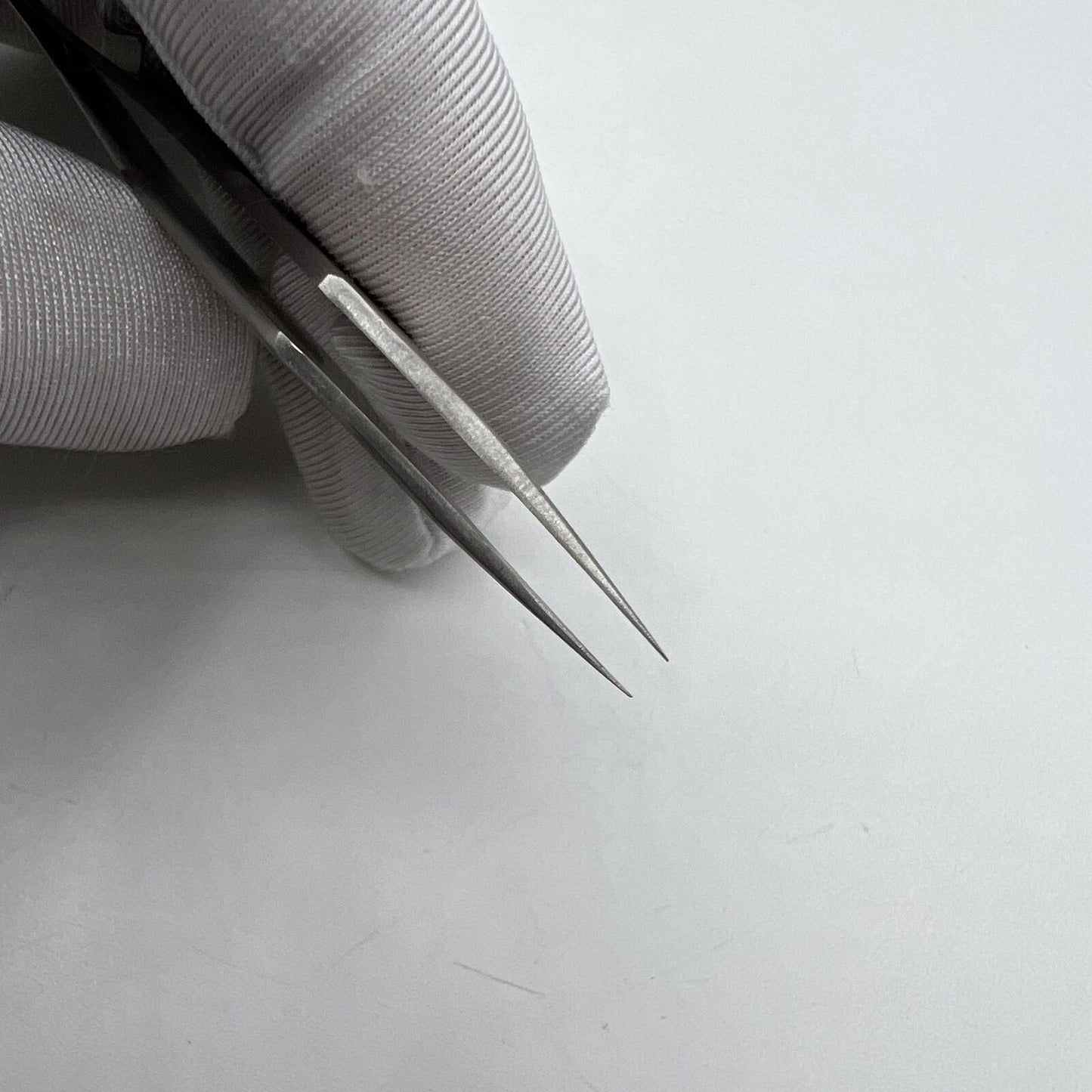 Horotec MSA12.302-4 antimagnetic steel tweezer for precise watch accessory adjustments, Swiss Made quality.