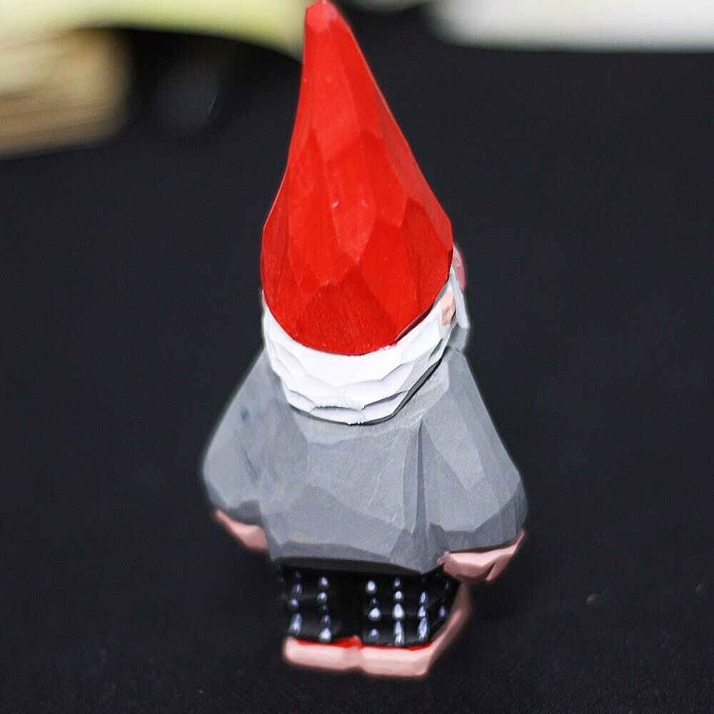 Handmade wooden dwarf garden elf sculpture, ideal for whimsical outdoor garden decoration.