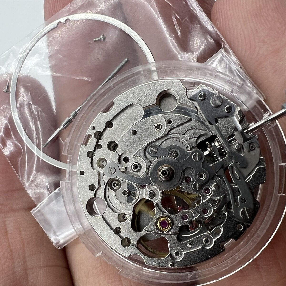 Miyota 82S0 silver plated automatic mechanical watch movement with hollow design, precision Japanese craftsmanship.