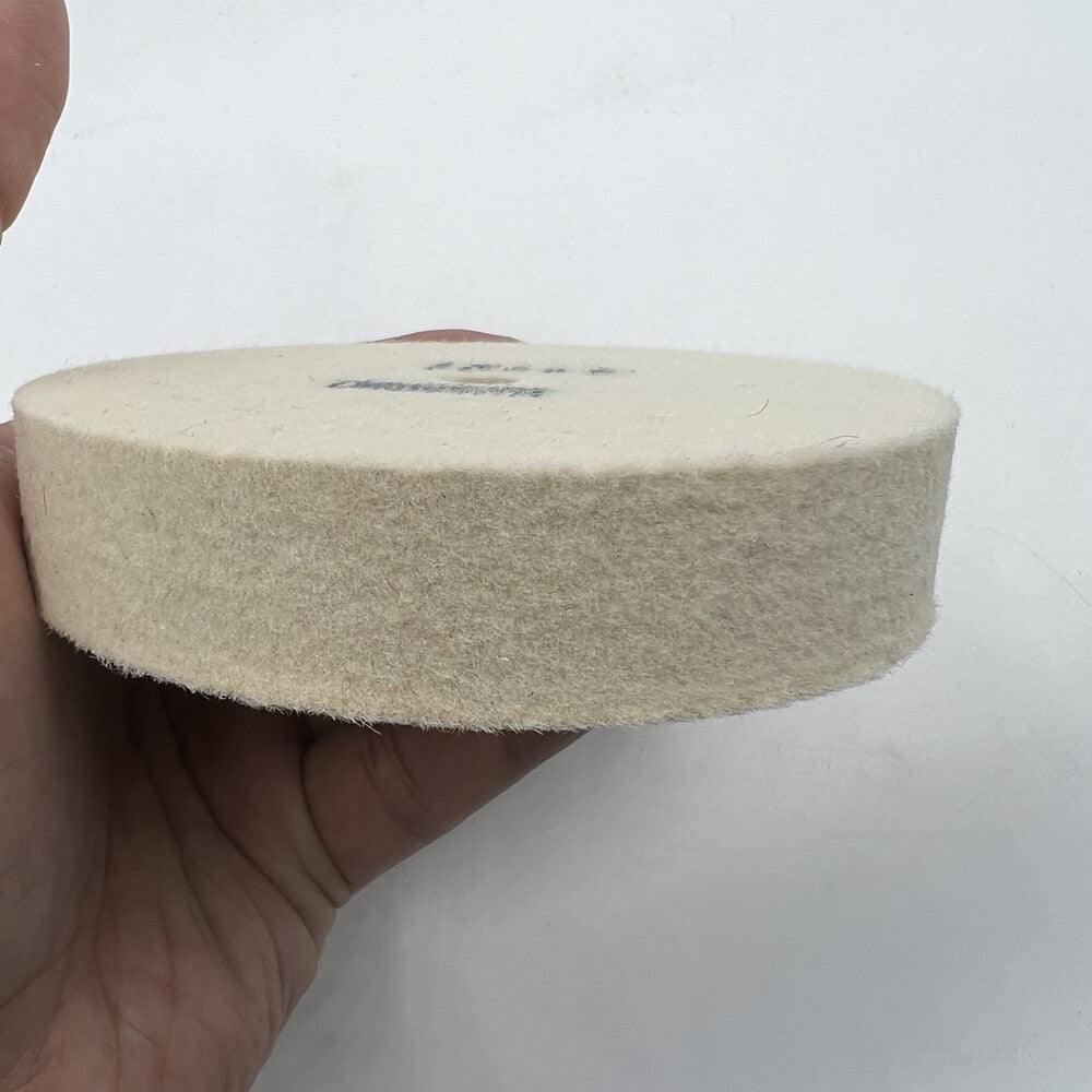 Bergeon 1207 white felt polishing wheel for watch accessories, Swiss precision finishing tool.