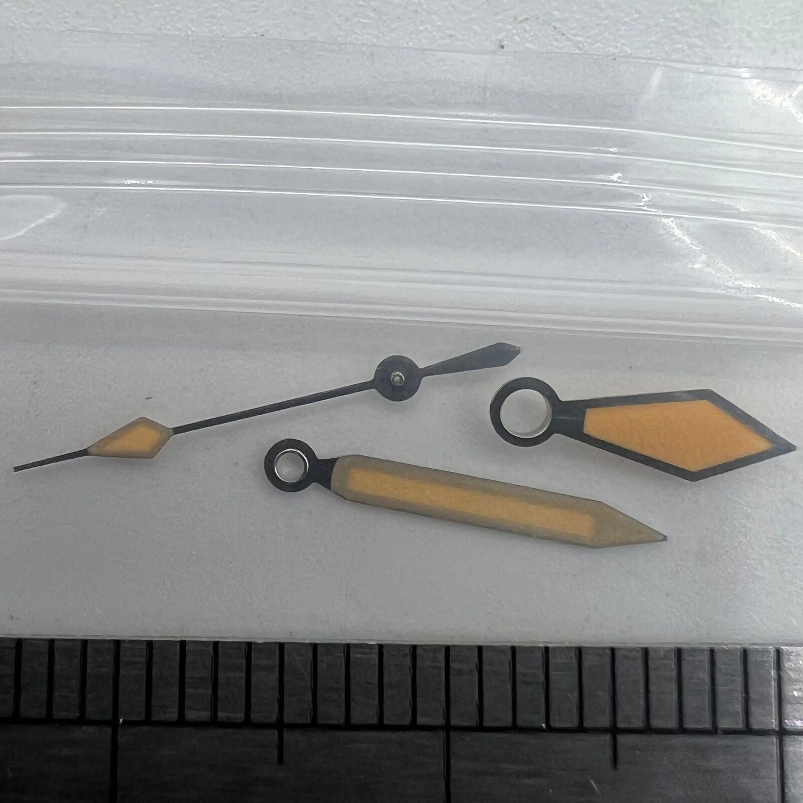 Vintage diamond-shaped watch hands with orange and green lume, silver trim for NH35/NH36 movements.