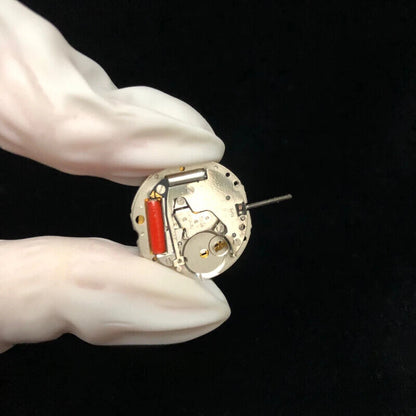 Golden silver Swiss RONDA 785 calendar quartz movement for precise watch accessory repair and customization.