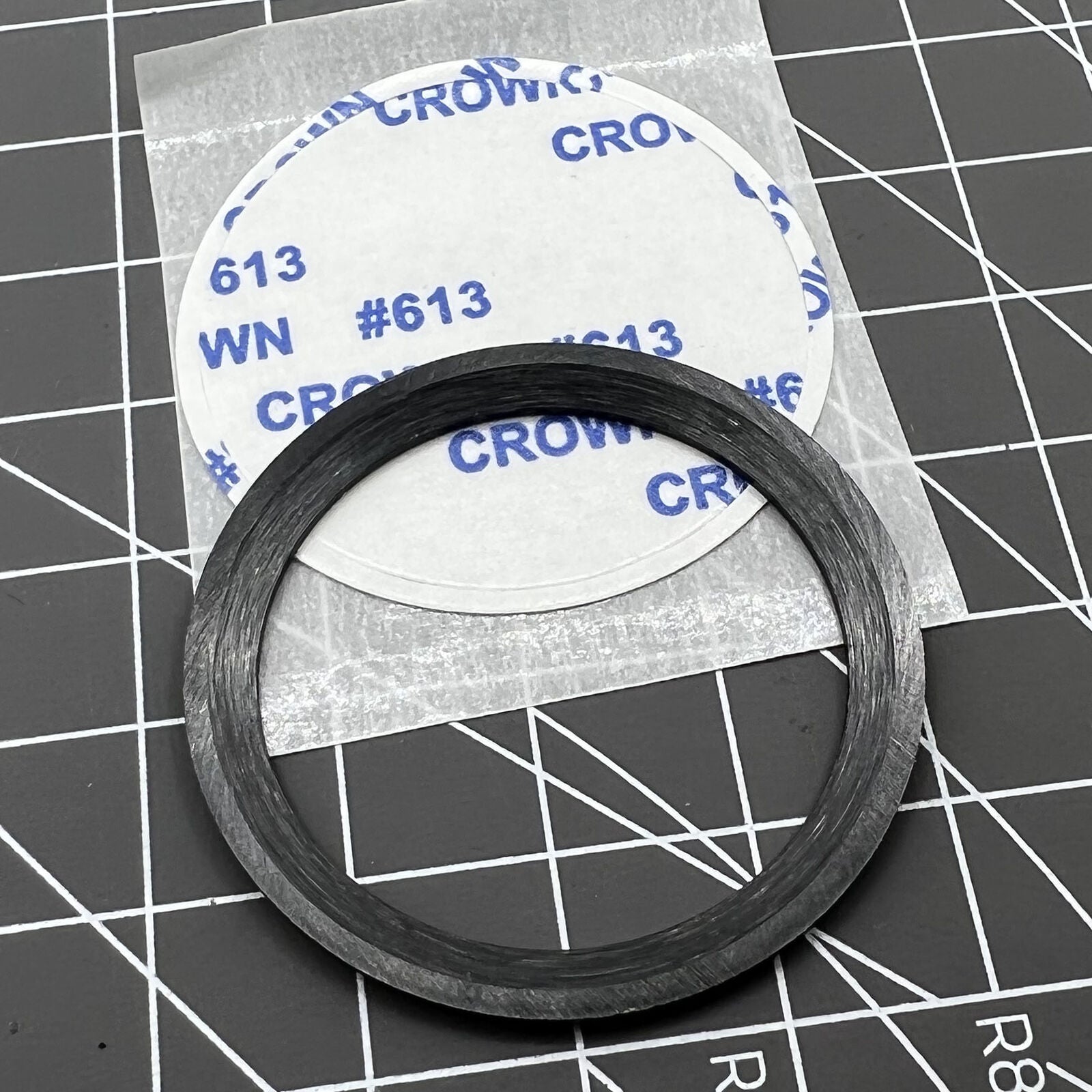 38mm black ceramic bezel insert with orange graduations for accurate timing.