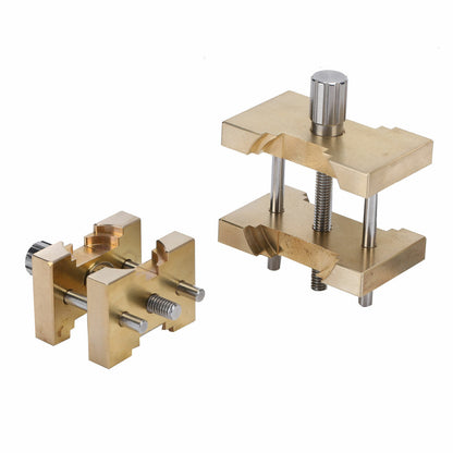 Copper vintage watch movement holder clamp vise for precise watchmakers repair tasks.