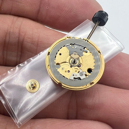 ETA 956.102 Swiss Made quartz watch movement with 3 hands for precise timekeeping.