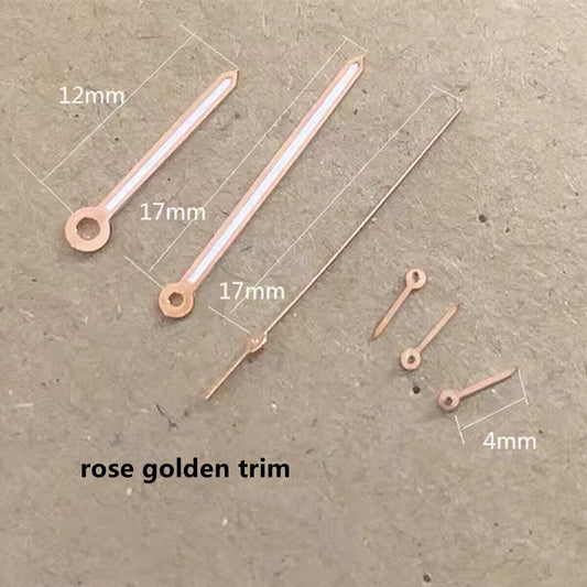 Rose golden 17mm watch hands with green lume, designed for PE90 movement.