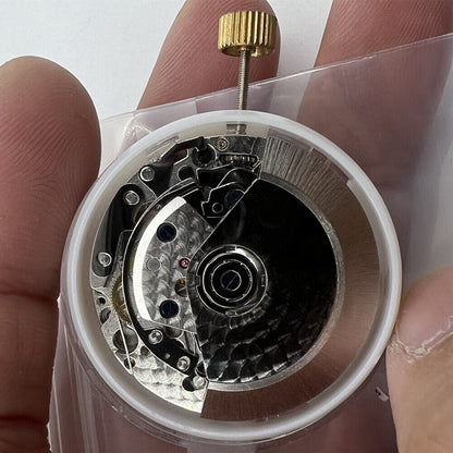 Asian 7750 chronograph movement with white dial, single calendar at 4:30, and seconds subdial at 9, ETA 7750 style.