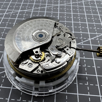 Dandong 7750 mechanical watch movement with small seconds at 3, 6, 9 o?clock, no calendar function.