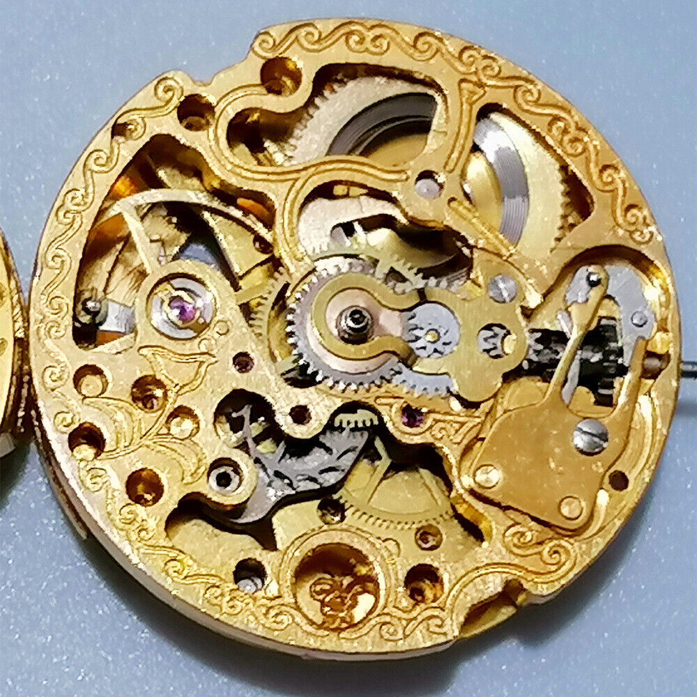 26.5mm 7120 automatic mechanical watch movement with carved hollow design in gold finish, high precision.