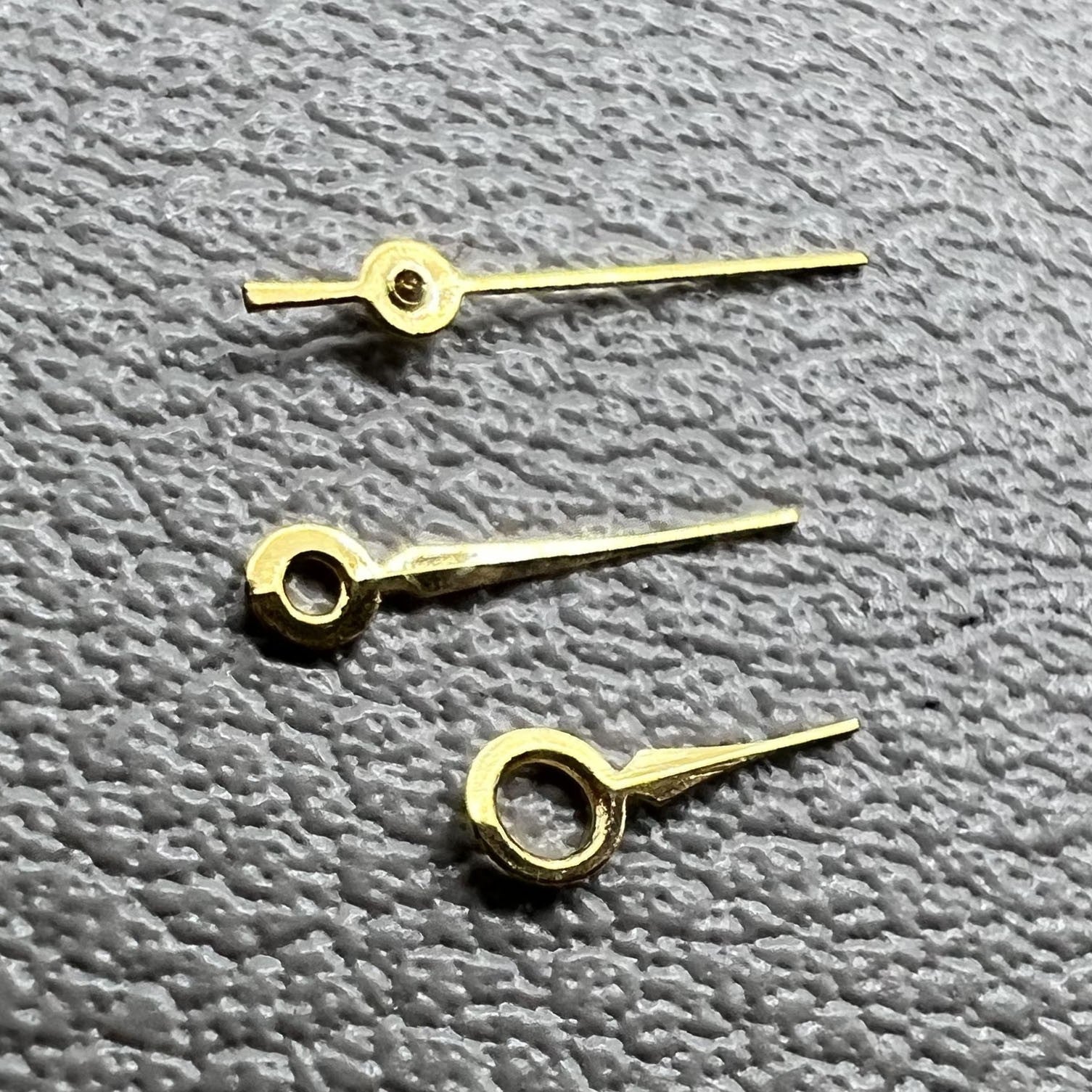 Golden watch hands set for Miyota 2035 movement, 2 sets per pack, perfect for watch repair.