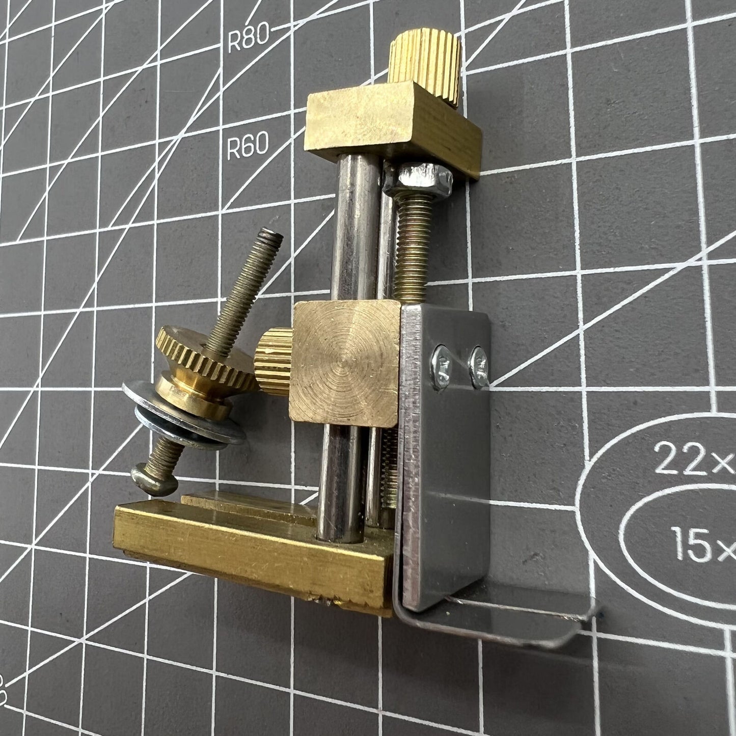 Auxiliary positioning tool for accurate watch stem cutting with cutter plier accessory.