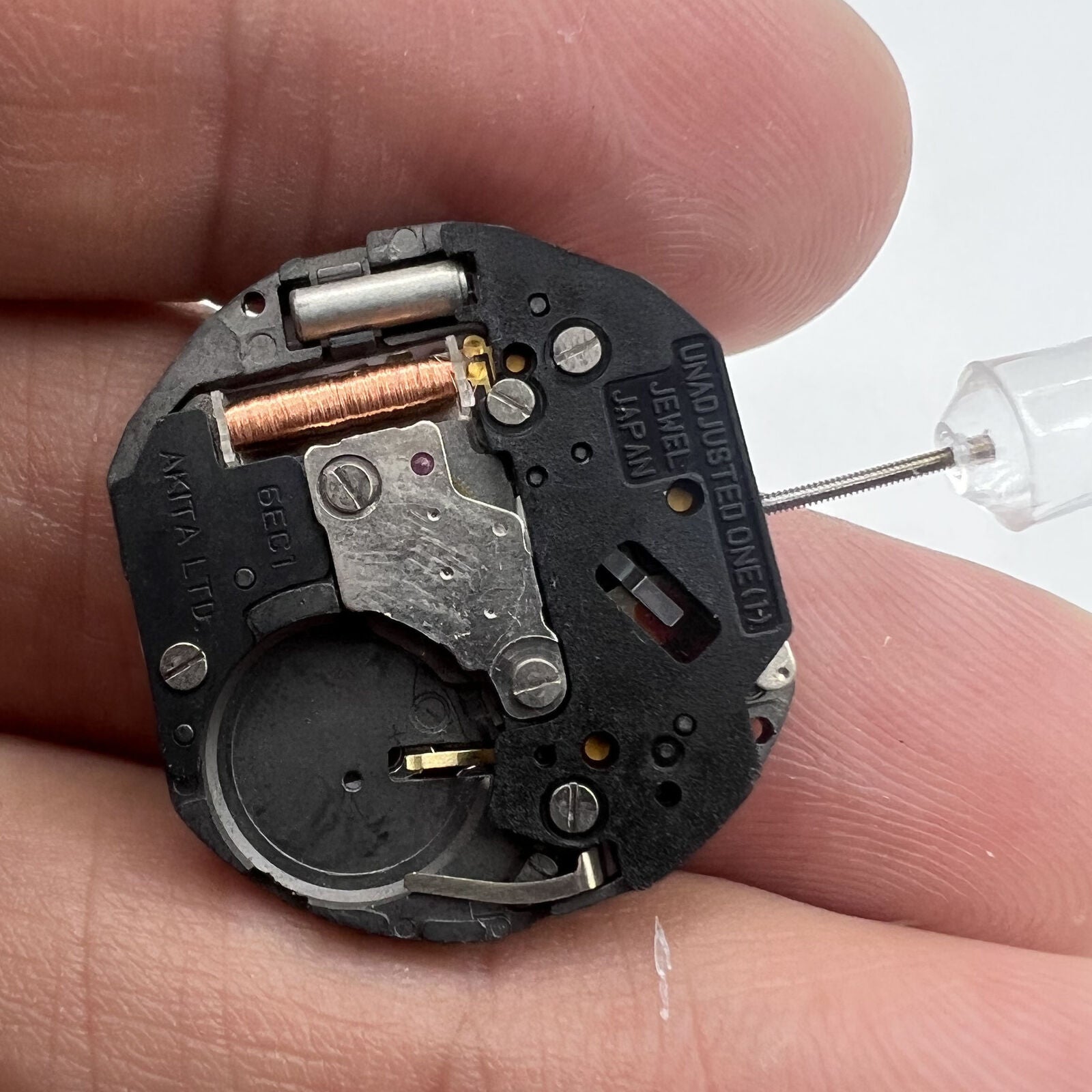 6EC1 quartz watch movement by Japan, date display at 3 o'clock for accurate timekeeping.