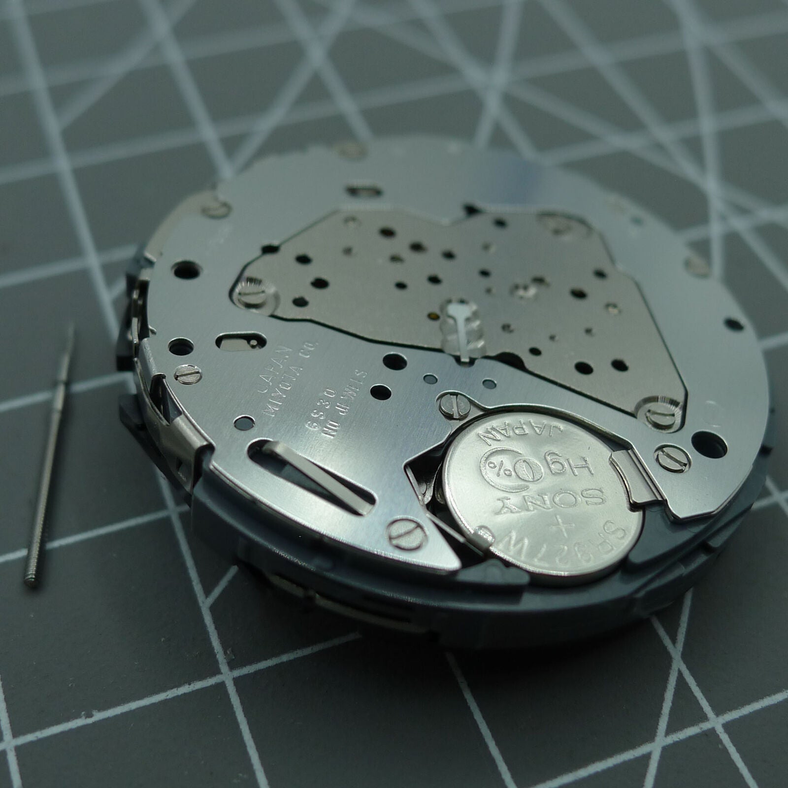 Japan-made Miyota 6S30 quartz watch movement with date at 4 and subdials at 2, 6, 10.