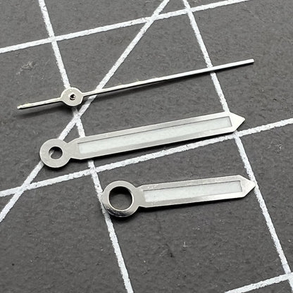 Set of 2 green luminous 17mm watch hands with silver trim for Miyota 2035, 2115, 2105, 2305 movements.