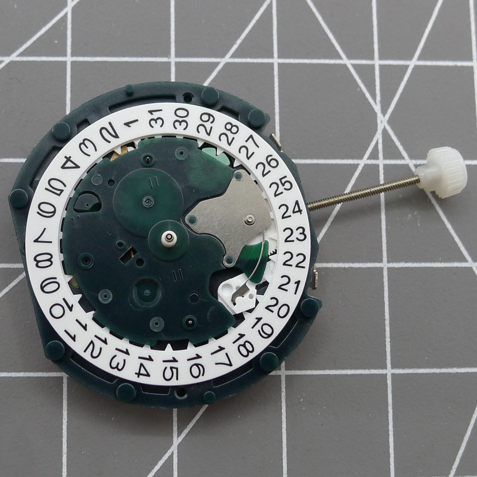 SUNON PE49 watch repair part with small second dial at 6 o'clock, quartz movement date function.
