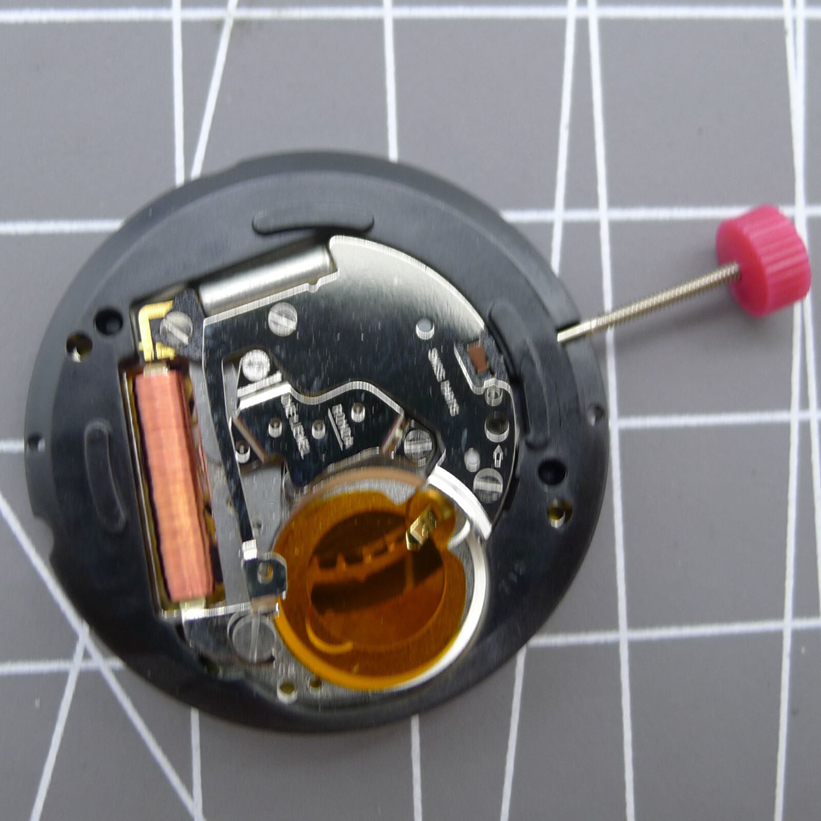 Swiss Ronda 715 Quartz watch movement with black date wheel at 6 o'clock, precise timekeeping by Ronda.