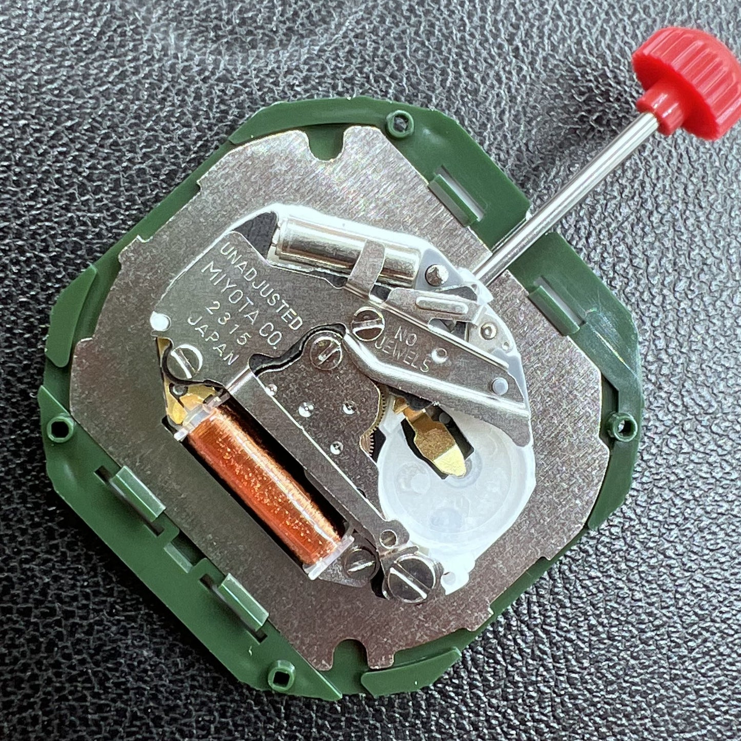 Japan Miyota 2315 quartz watch movement with three hands and date at 6 o'clock, crown pin included