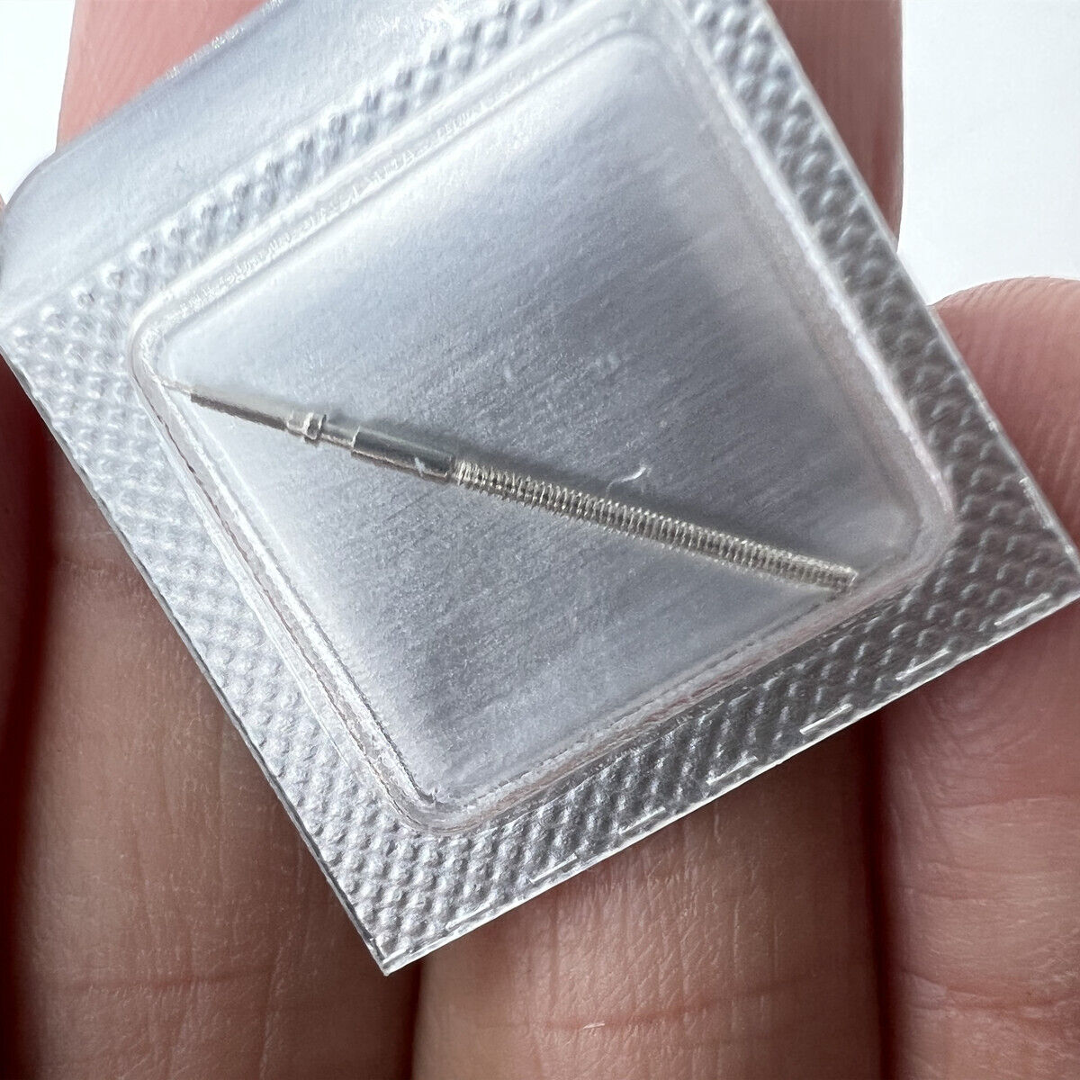 Replacement watch winding stem for Soprod A10, durable spare part for precise watch repairs.