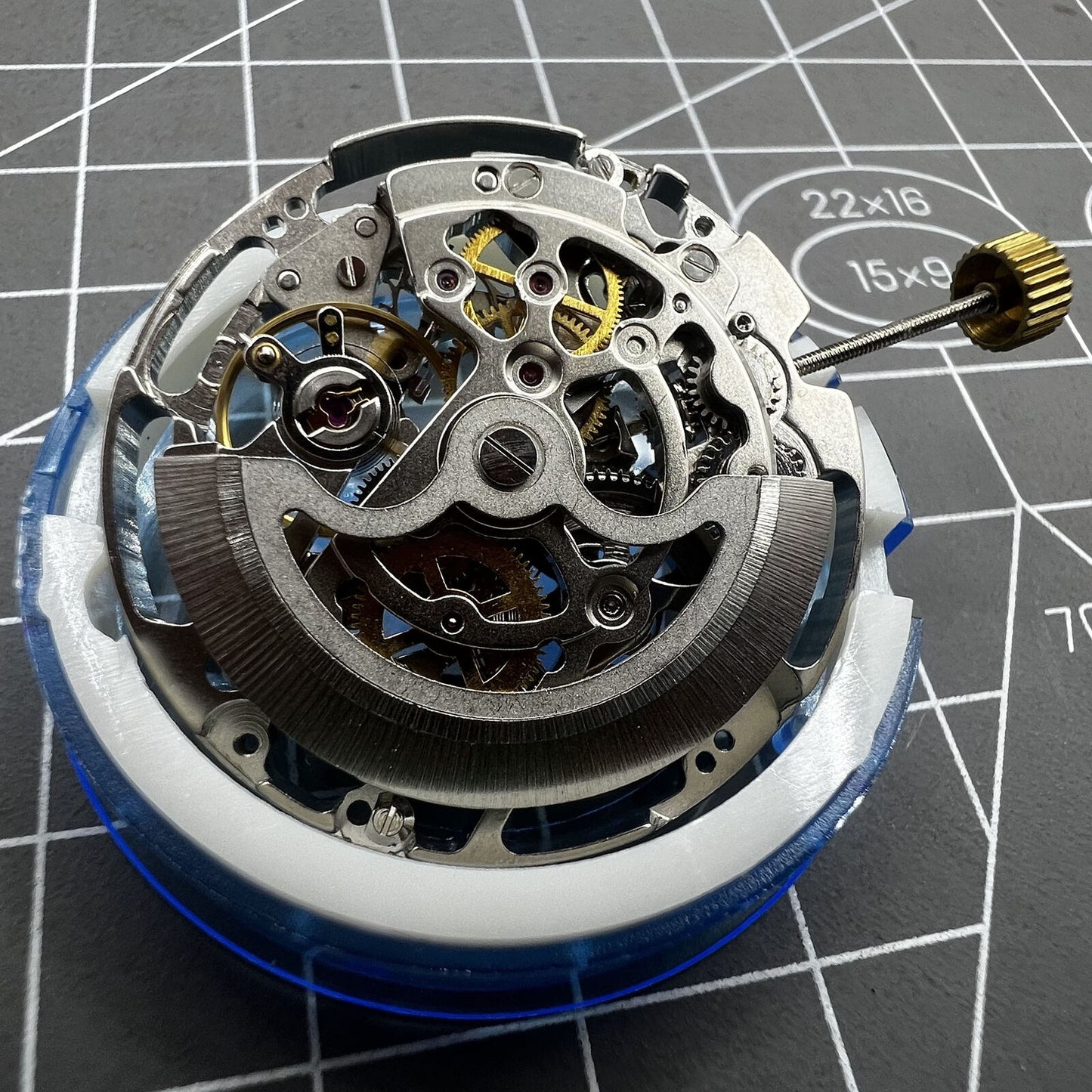 Dandong Silver hollow automatic mechanical watch accessory highlighting second stop function for precision timekeeping.