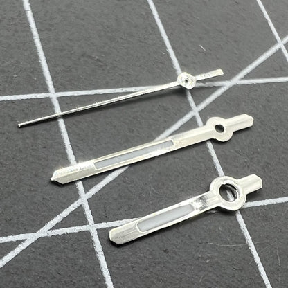 Silver-trimmed 13mm watch hands with green lume for Hattori Epson PC32 quartz movement accessories, enhancing readability and style