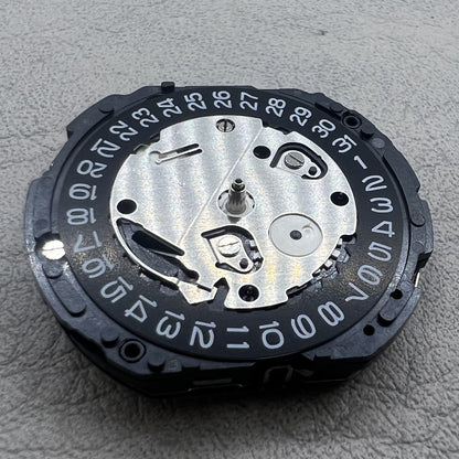Seiko 7T12A quartz movement watch accessory with black single date display disc for precision timekeeping