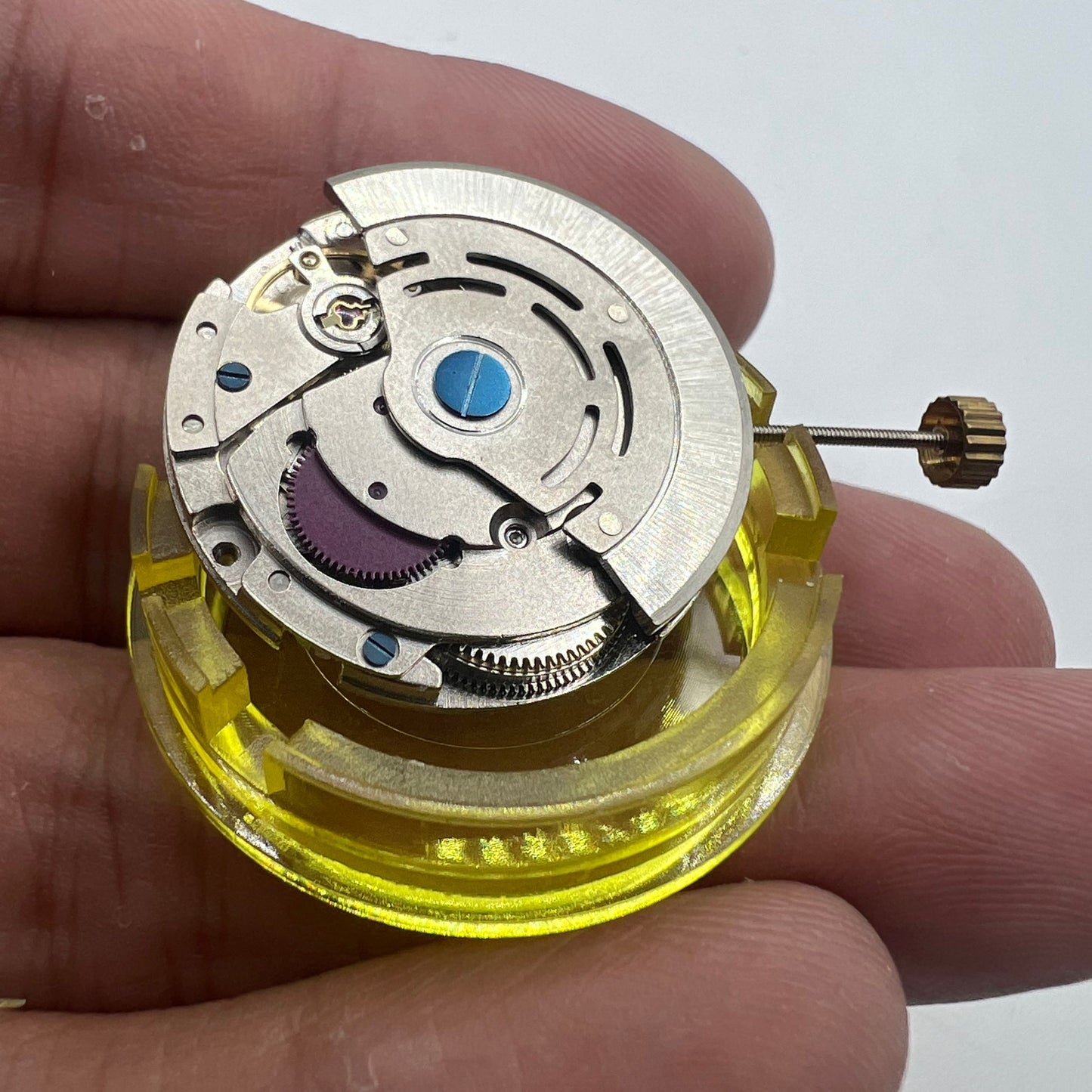 DG2813 automatic mechanical watch movement with three hands and date display, durable replacement part for watches.
