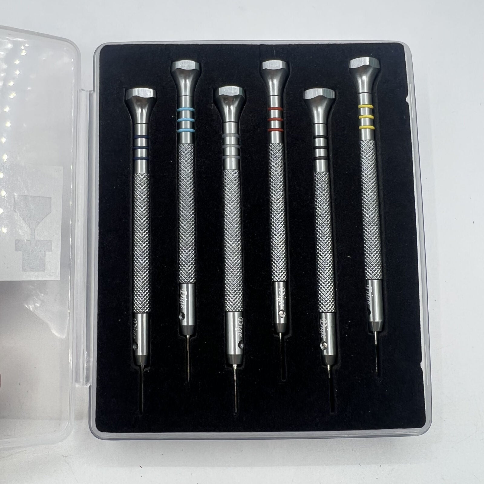 Stainless steel watch bracelet adjusting tool with 6 sizes for precise strap fitting.