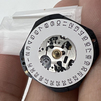 Hattori Epson VX32E quartz watch movement with date display at 3 o'clock, Japan Made.