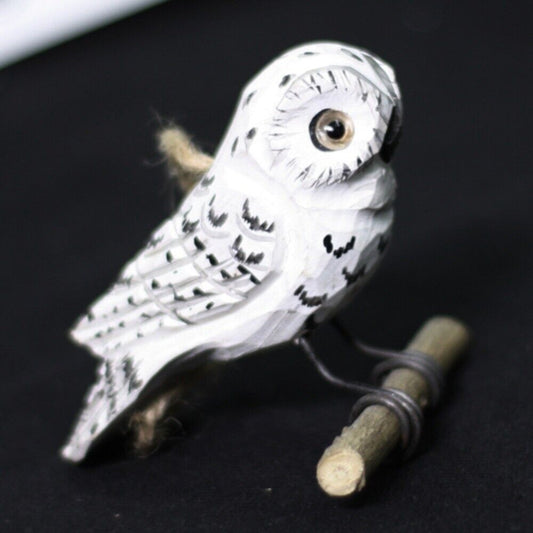 Handmade white owl wooden figurine, charming decorative artwork for home or office display.