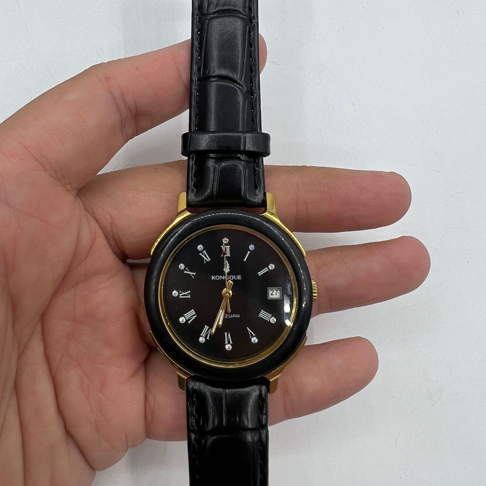 Kongque 37mm automatic watch with black dial, Roman numerals, and 33 jewels for accuracy.