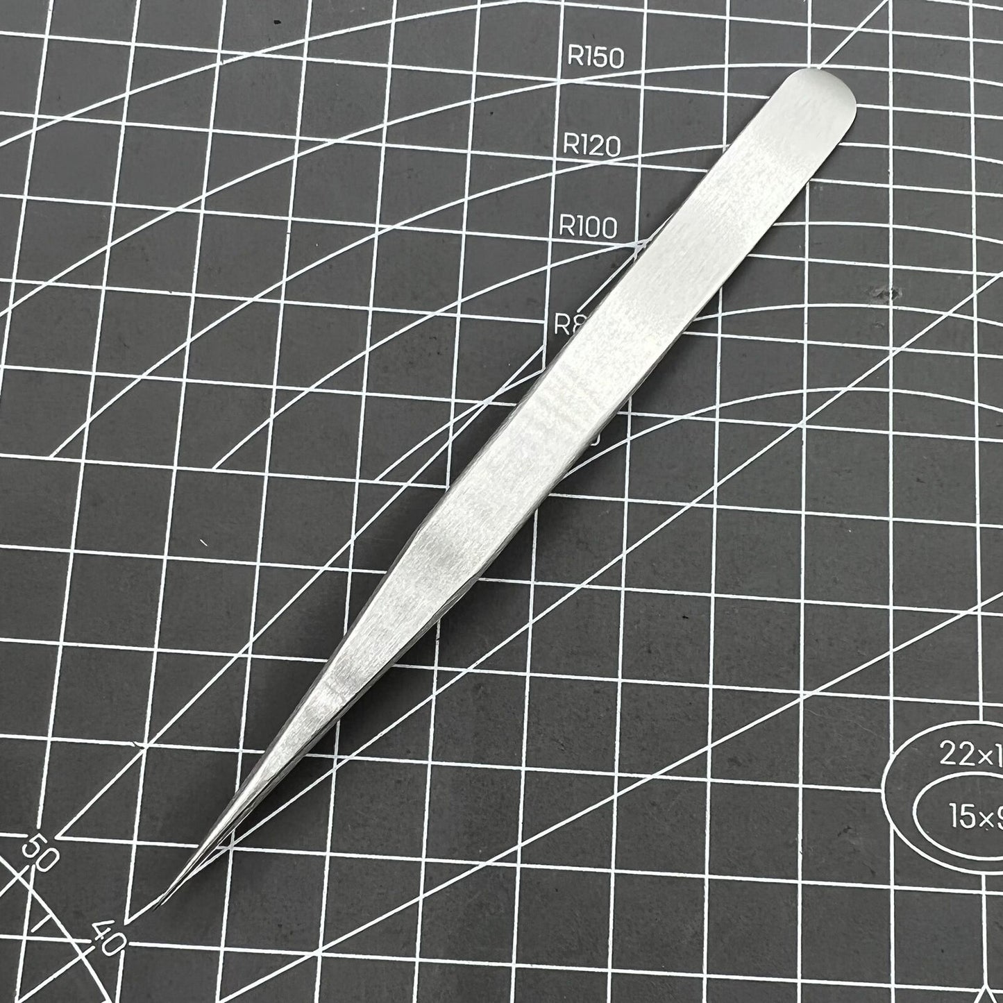 Swiss Horotec MSA12.302-3 antimagnetic fine tweezers for precise hairspring handling and watch repairs.